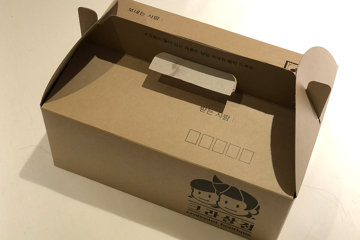 展示克拉商店的獨特外賣盒，既實用又具美觀性。