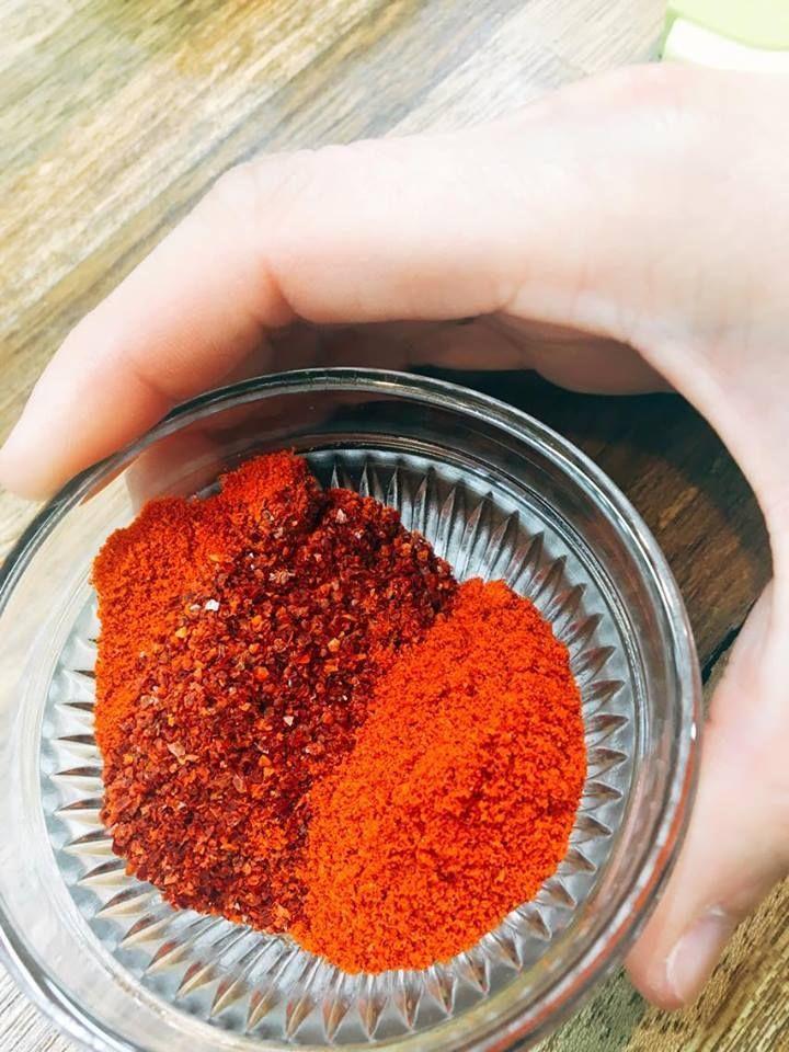 Close-up of Korean chili powder in a glass dish, used for tteokbokki preparation.