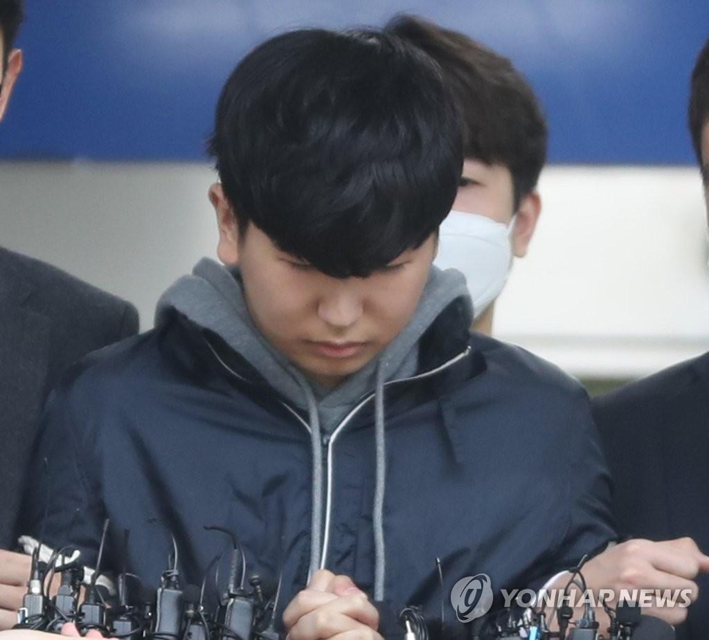 カン・フン、逮捕時の写真