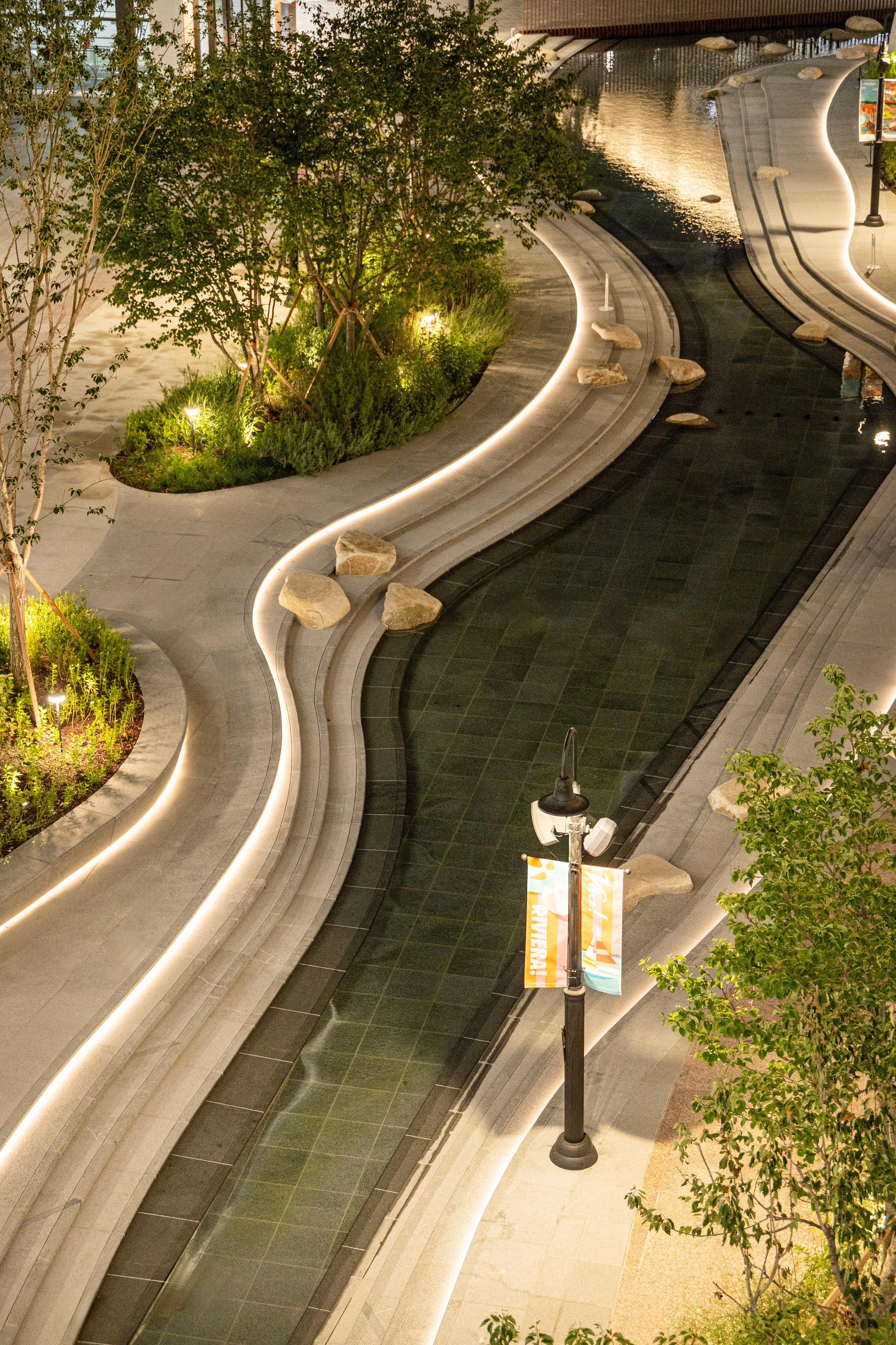 Illuminated water feature at night