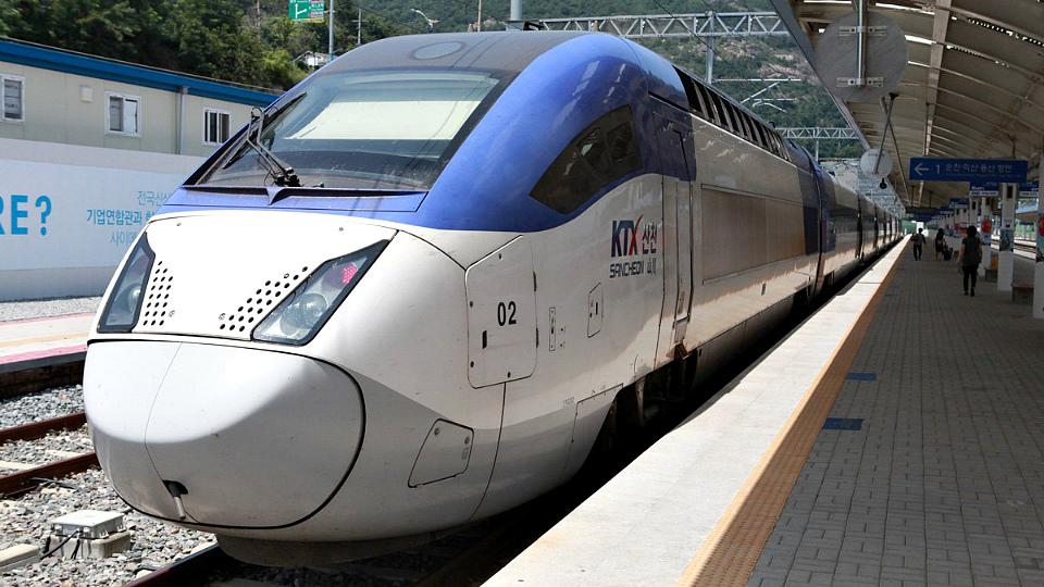 KTX train with windscreen wipers traveling on railroad track in Korea