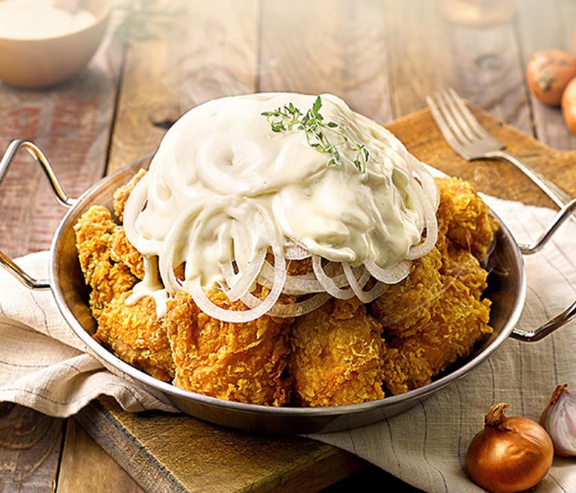 Delicious Korean cuisine with staples like fried food and idiyappam served on tableware. Ingredients and recipes for NeNe Chicken delivery also featured.