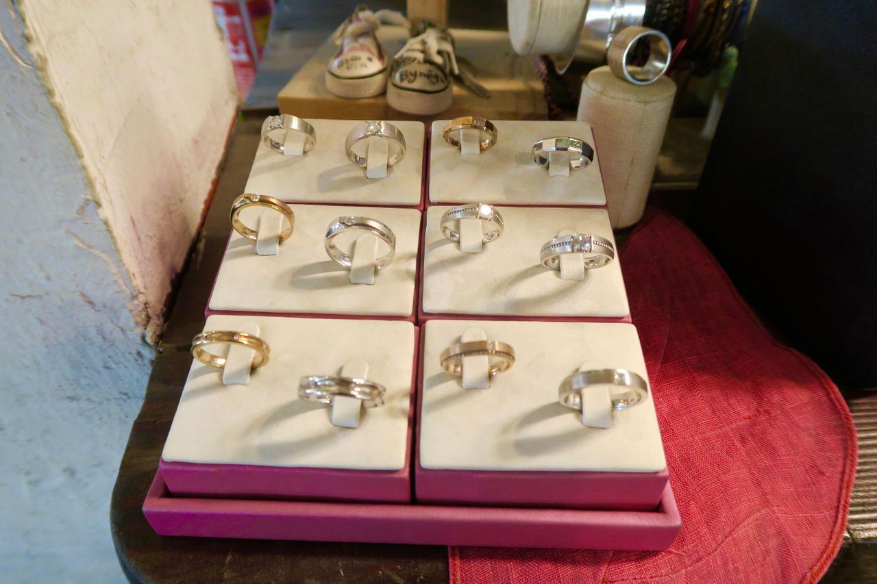 Unique artisanal eyewear, jewelry and audio equipment displayed in eclectic Hongdae cafe workshop.