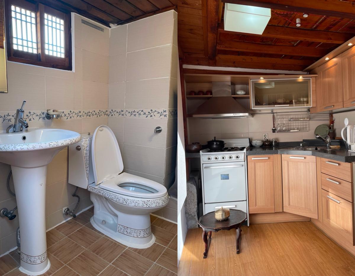 Left: tiled bathroom with pedestal sink and decorative toilet under a small wooden window. Right: compact wooden kitchen with stove and cabinets.
