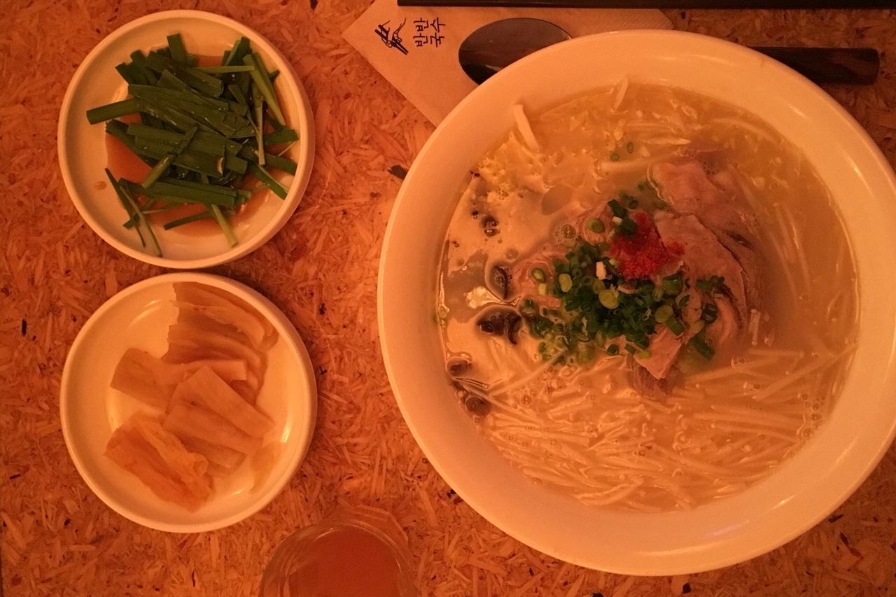 Bowl of Half and Half Noodles with Beef and Vegetables, a Popular Korean Soup Dish.
