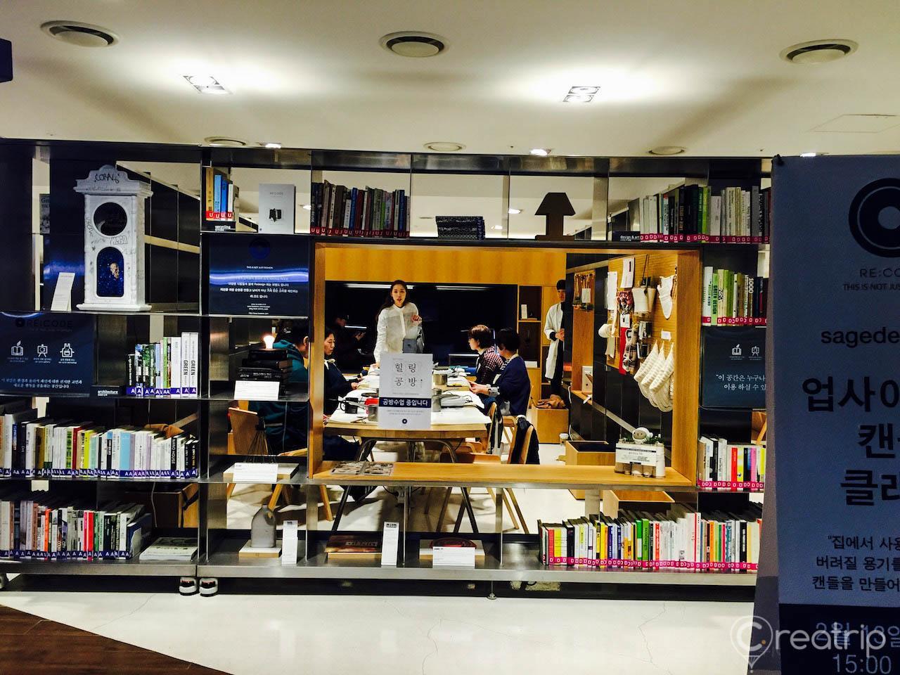 display case showcasing publications and customer souvenirs at 1898 Plus, a retail store in the historic Myeong-dong Cathedral area.
