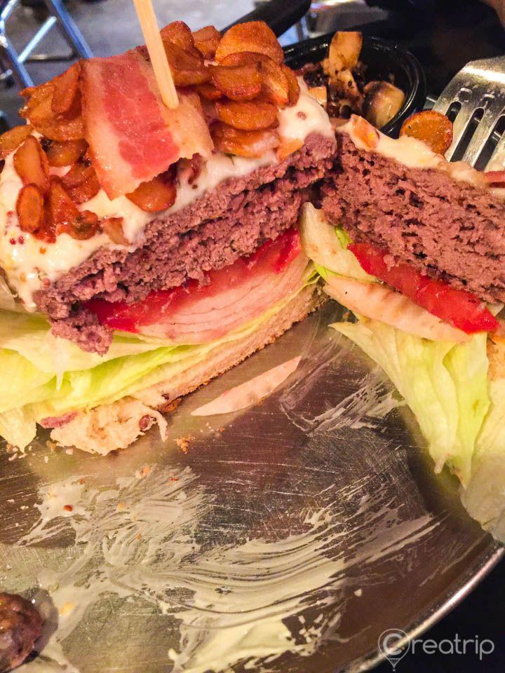 Jacoby Burger with tableware, ingredients, and baked goods on a dish, a staple Korean sandwich cuisine.