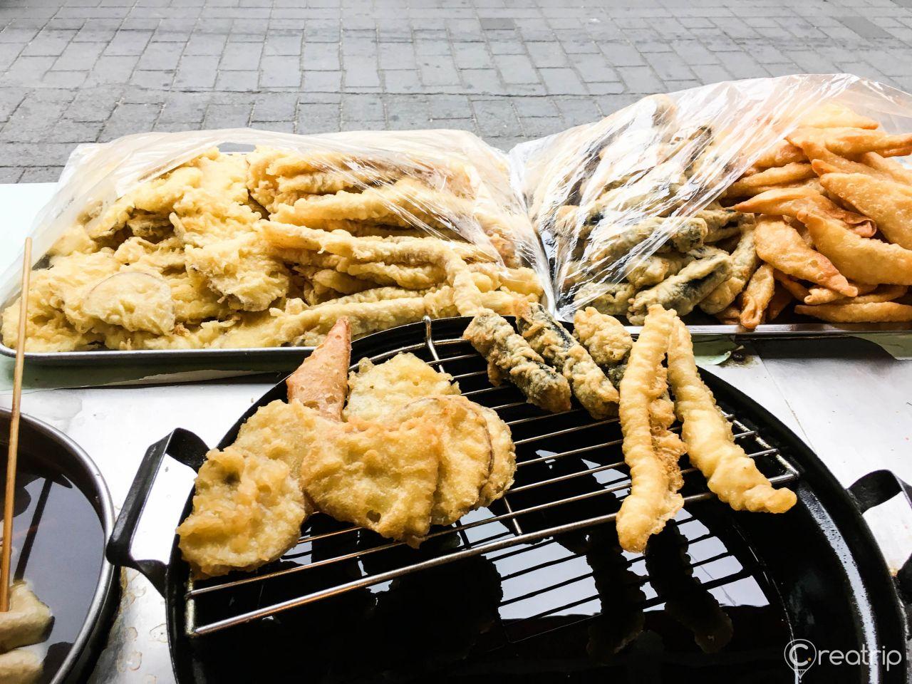 Traditional Korean street food with rice cakes, roasted and fried ingredients, perfect for grilling or deep frying, Seoul, Korea.