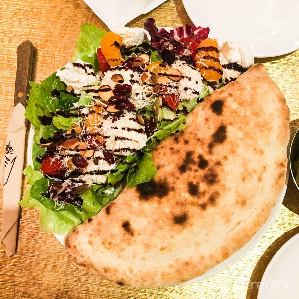 A baked dish from pasta market with ricotta classica and fines herbes.