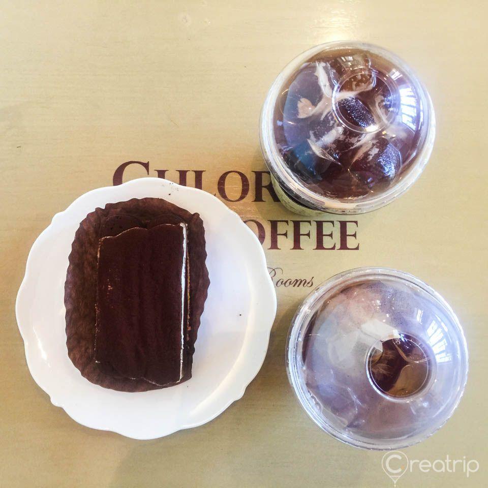 Violet dish and drinkware on a cafe table at Chloris Gangnam GFC, Korea.