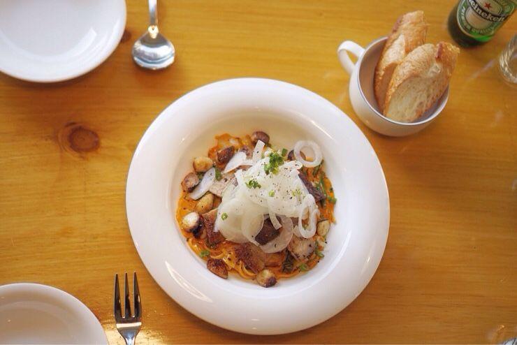 A fine herb dish with assorted food and tableware on a kitchen table in Korea.