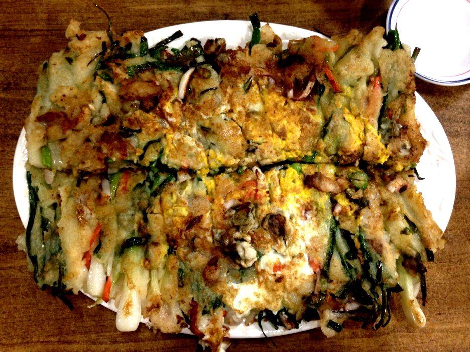 traditional Korean dish, Dongrae Pa-Jeon made with meat, vegetables and ingredients served on tableware in Seoul, Korea.