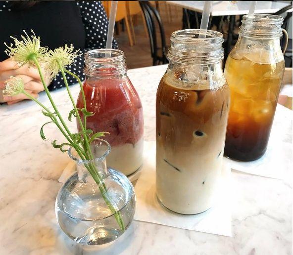 Table with The Famous Ram bread, coffee, and buffet items including drinkware and tableware.