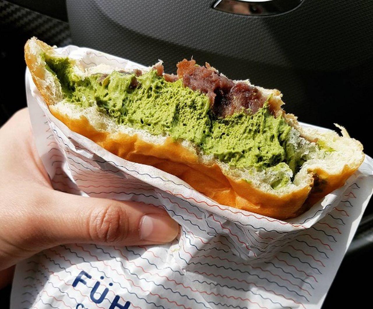 Delicious baked goods from a Korean bakery with a filling of fine herbs cream, perfect for a tasty sandwich.