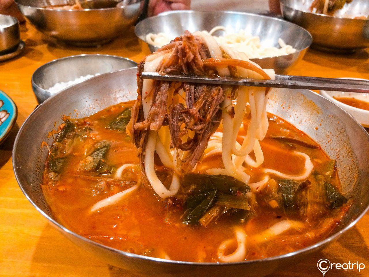 Chosun's spicy chicken soup Kalgooksoo image 1