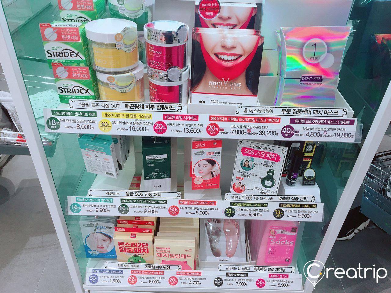 Packaged products in various containers including aluminum and tin cans and boxes at Olive Young in Hongdae, Korea.