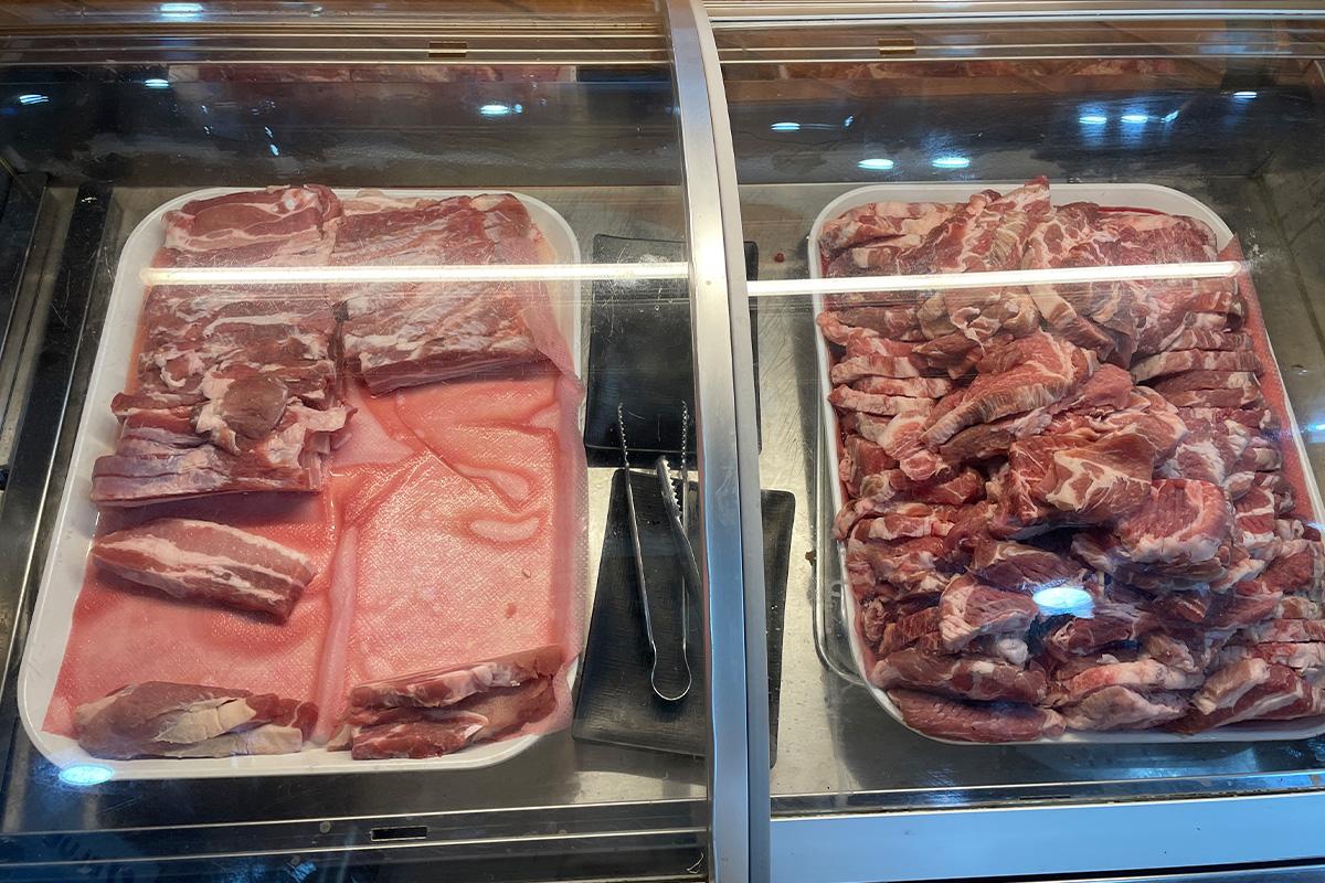 Red meat dish of 삼겹살 (pork belly) at 엉터리생고기 명동점, a popular Korean cuisine restaurant - perfect for curing your cravings!