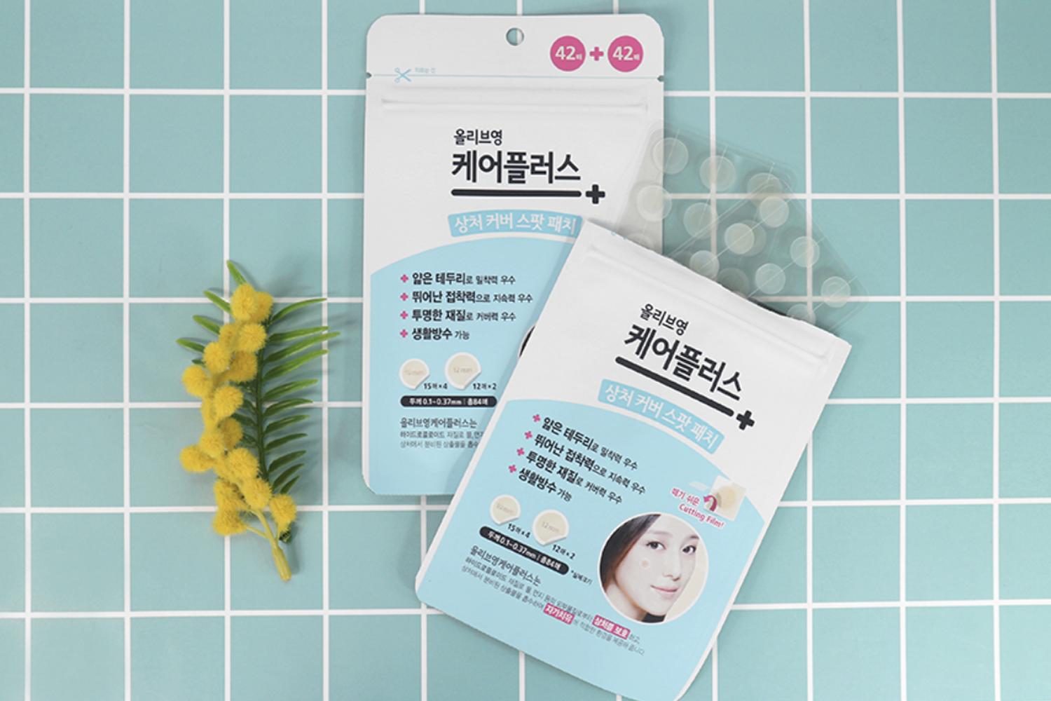 korean brand olive young Care Plus Scar Cover Spot Patches with tile background