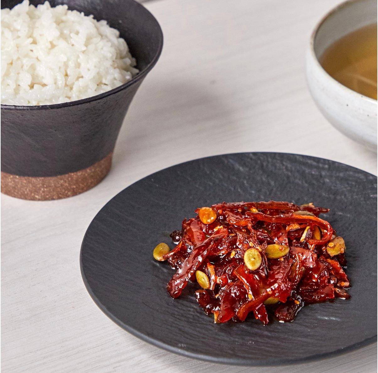 korean brand sempio's stir-fried dried pollock in gochujang in plated with rice