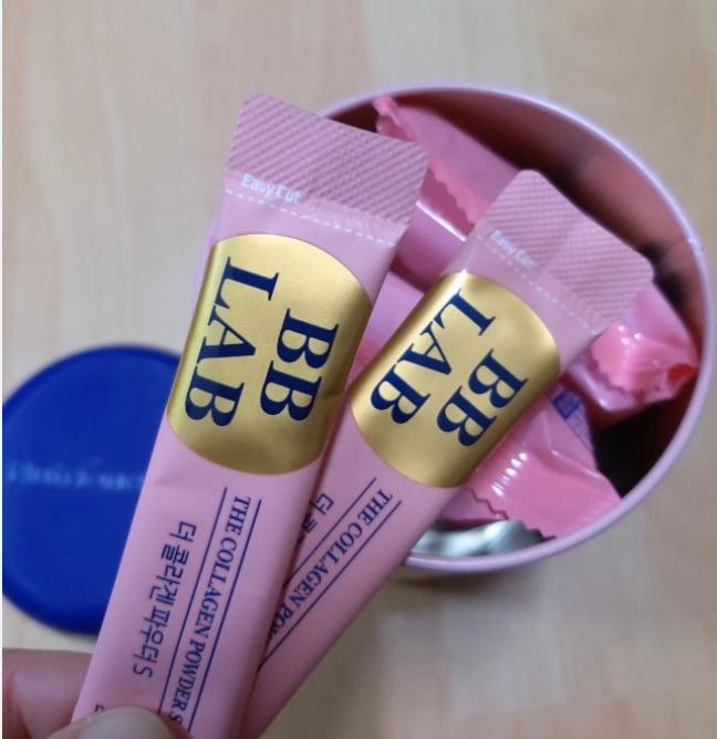 two pink sticks of korean brand nutrione bb lab collagen 