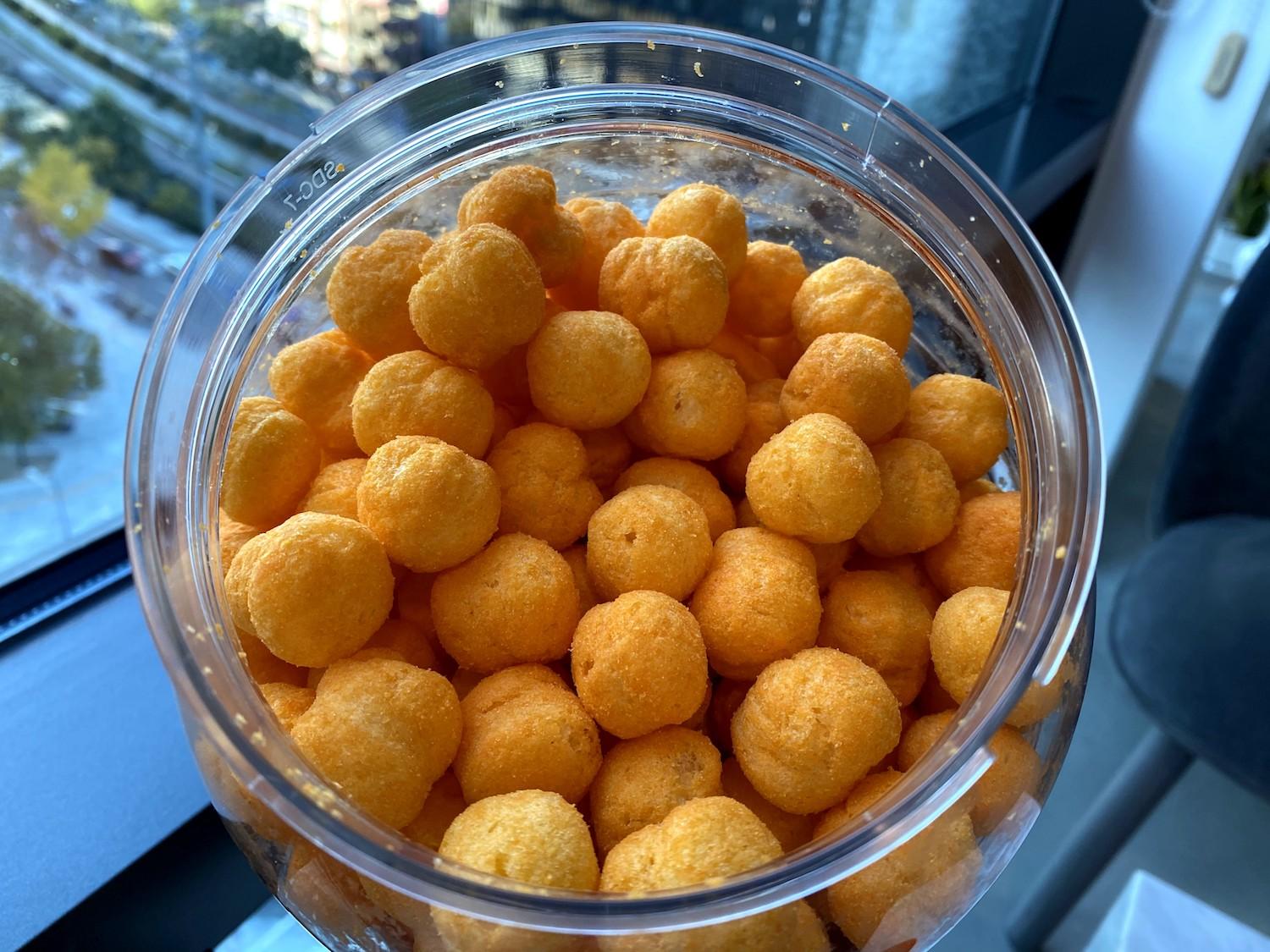 open jar of korean brand no brand's cheddar cheese ball snack