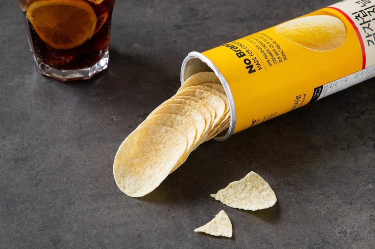 korean brand no brand potato chip original container on its side with chips spilled out