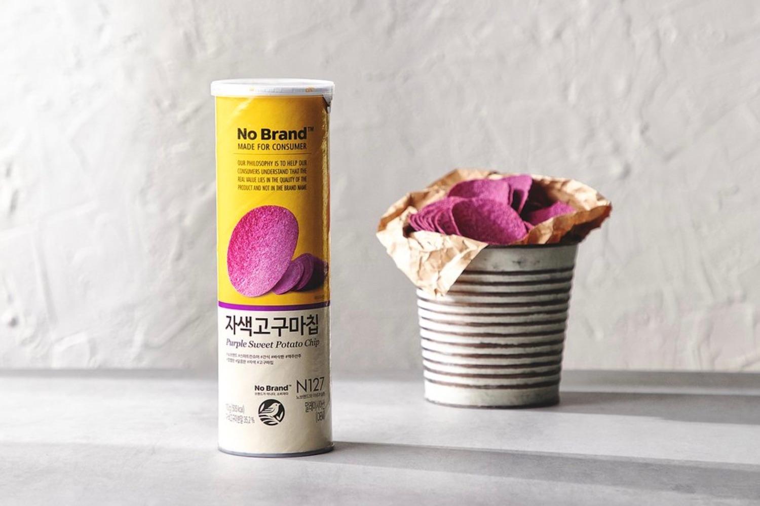 korean brand no brand's purple sweet potato chip container next to metal container filled with chips