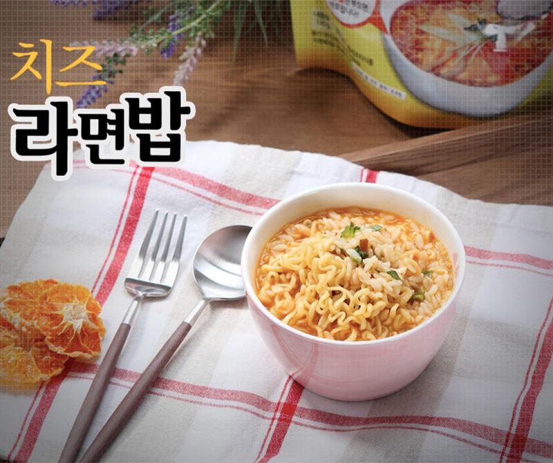 korean brand doori doori's cheese ramen rice in small bowl set up on cloth