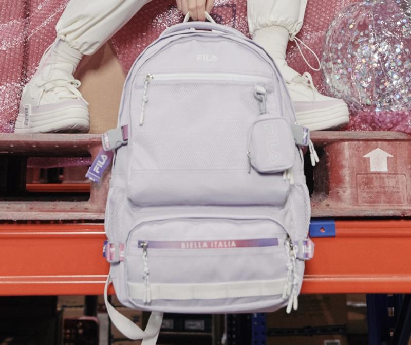 korean fila link 21 backpack in purple held by top handle