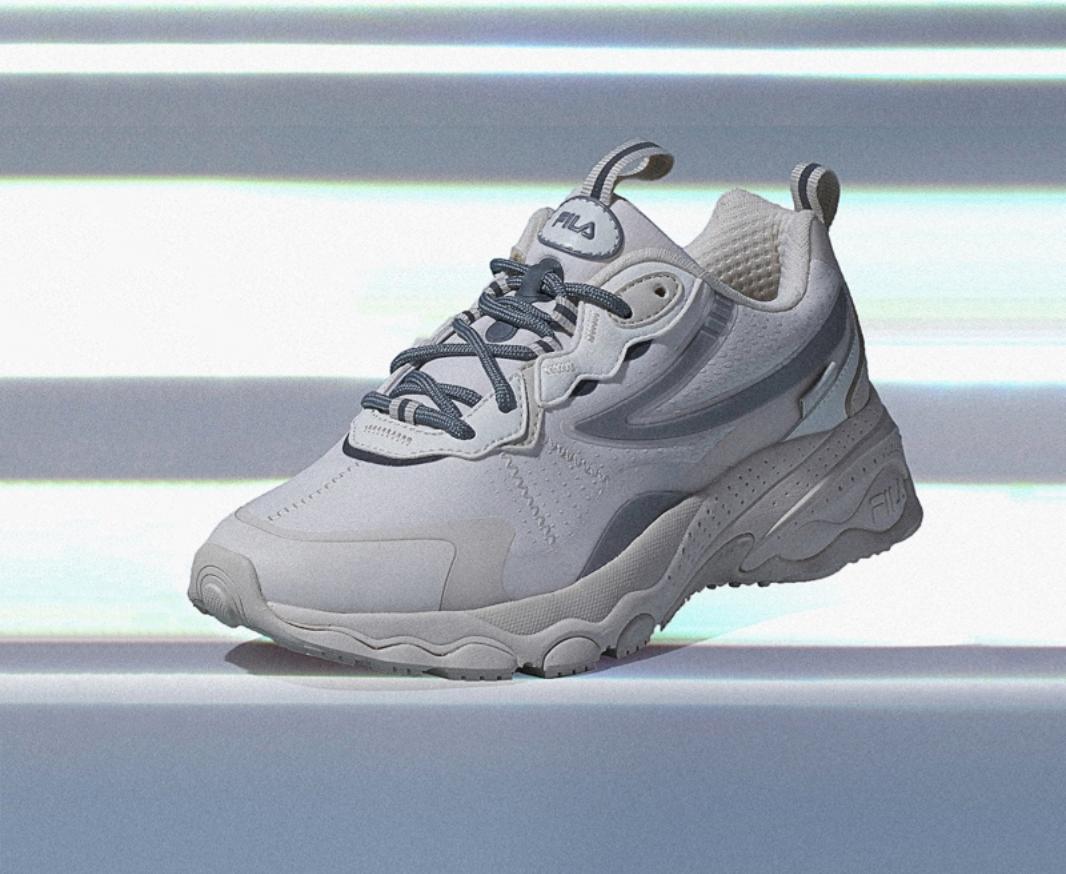 fila korea bubble tr sneakers in grey and white with grey striped background