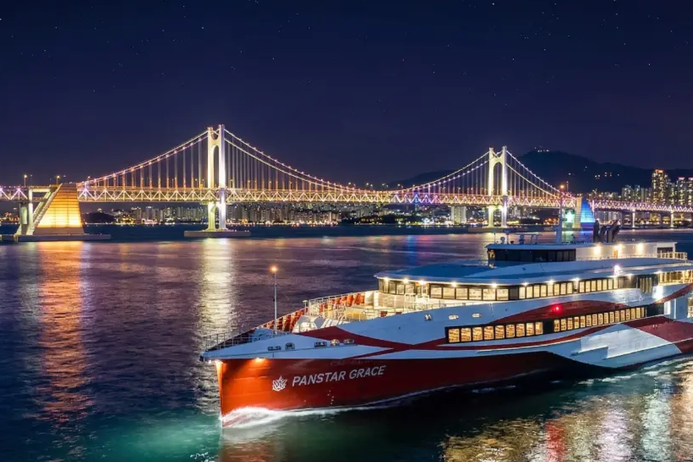 A yacht and Gwangan Bridge in the night view